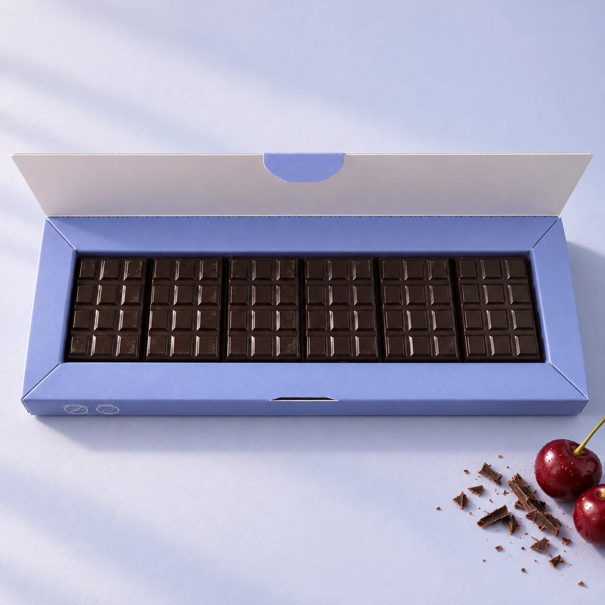 Boîte ouverte de 24 carrés de chocolat à la mélatonine sans sucres ajoutés